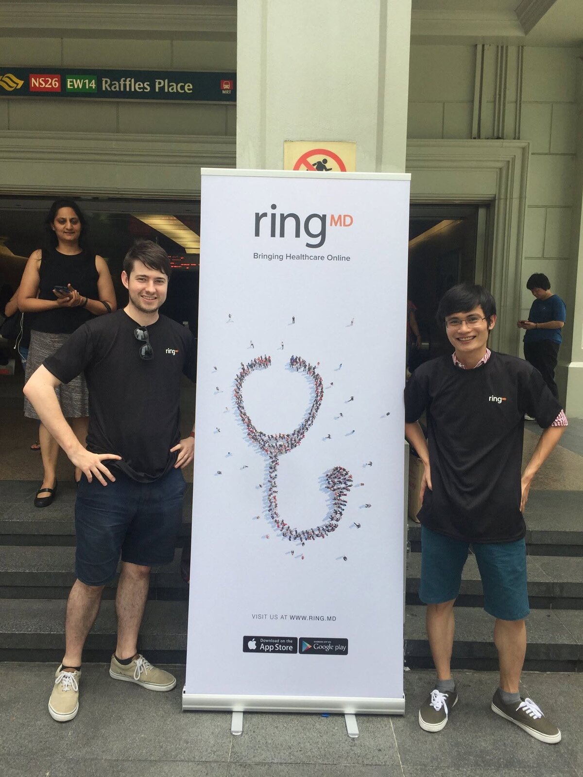 Justin Fulcher and Long Nguyen promoting RingMD at an MRT station, December 8, 2015